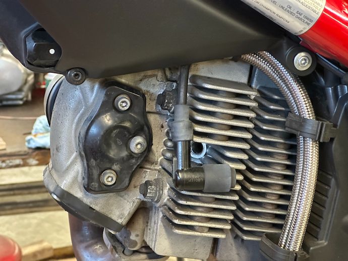 Spark plug and boot off of the front cylinder