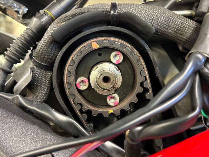 Rear cylinder timing pulley with paint pen marks running more than 90º off of previous photo