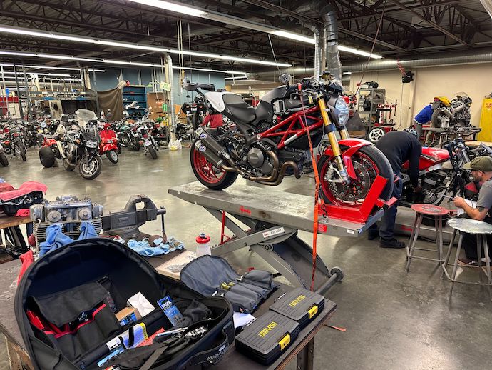 Monster on raised work stand